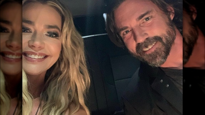 Denise Richards and Aaron Phypers posing for car selfie