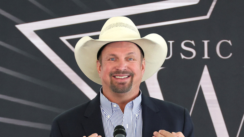 Garth Brooks speaking onstage