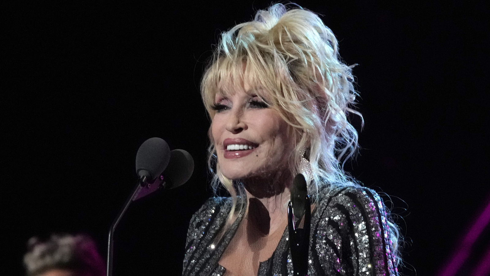 What We Know About Dolly Parton And Garth Brooks' Relationship