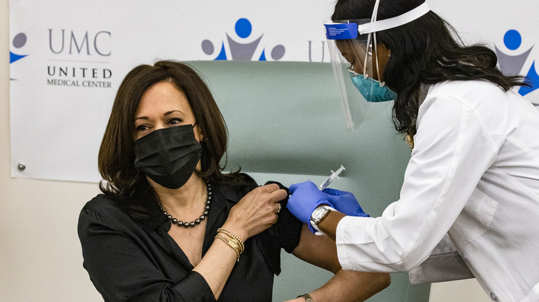 Registered Nurse Patricia Cummings administering the Moderna COVID-19 vaccine to Vice President-elect Kamala Harris