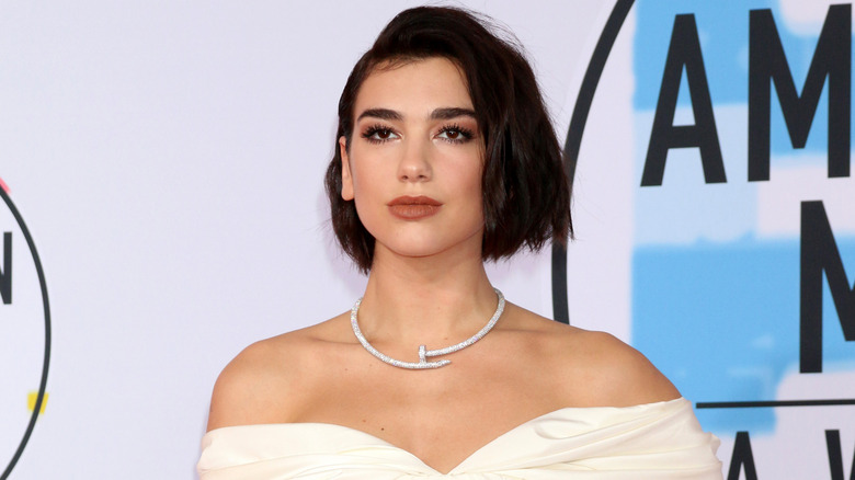 Dua Lipa posing on the red carpet