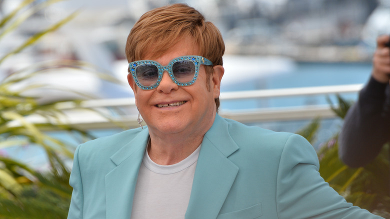 Elton John on a red carpet