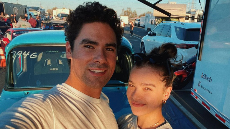 Griffin and Hailee Steinfeld pose for a selfie by Griffin's car