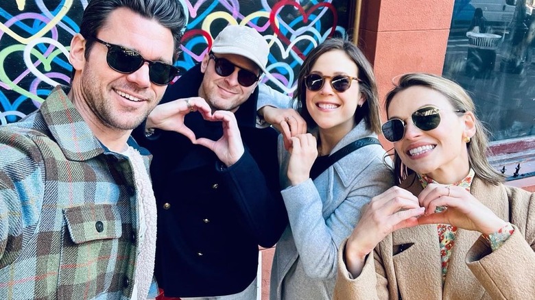 Erin Krakow and Ben Rosenbaum make heart signs with Kevin McGarry and Kayla Wallace