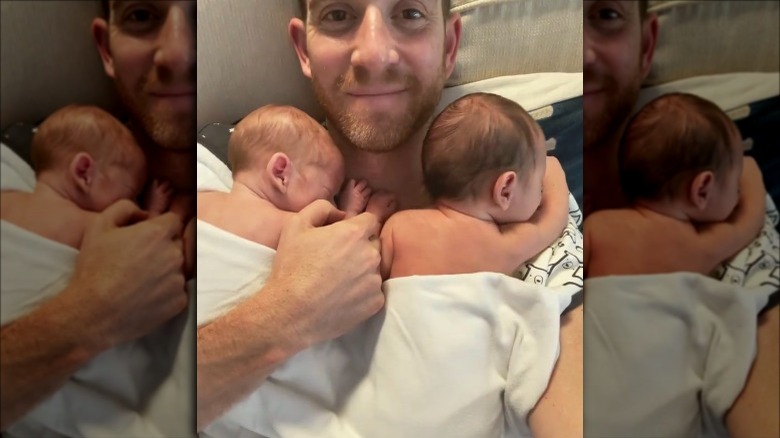 Bryan Greenberg posing with newborn twins