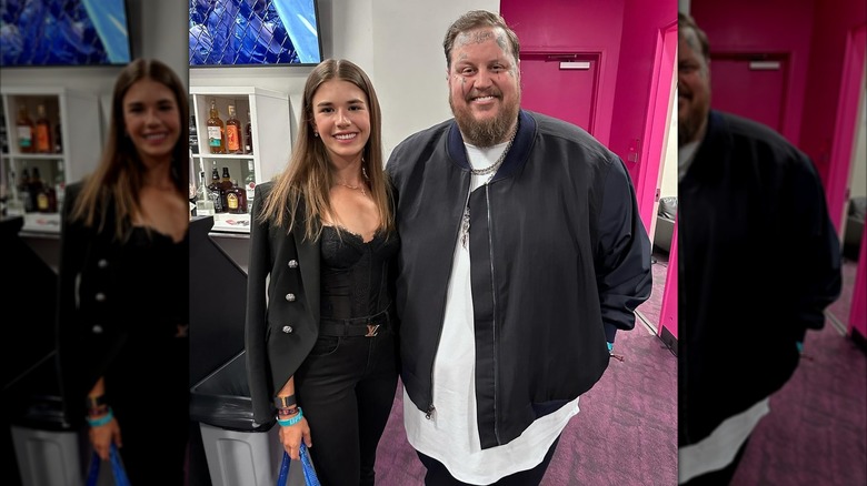 Jelly Roll posing with Kai Trump backstage at a UFC event