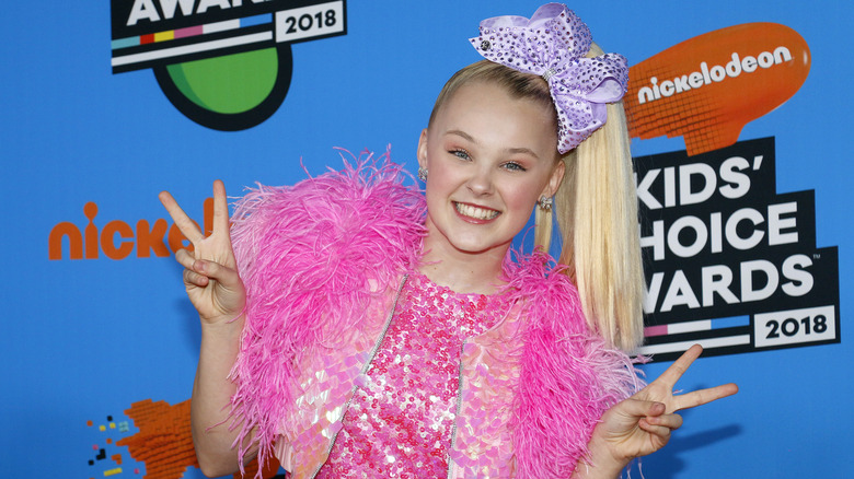 JoJo Siwa smiling on the red carpet