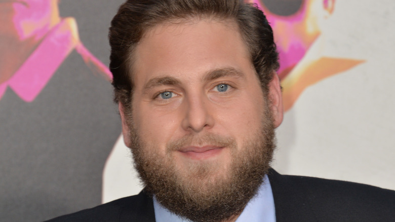 Jonah Hill smiles on the red carpet