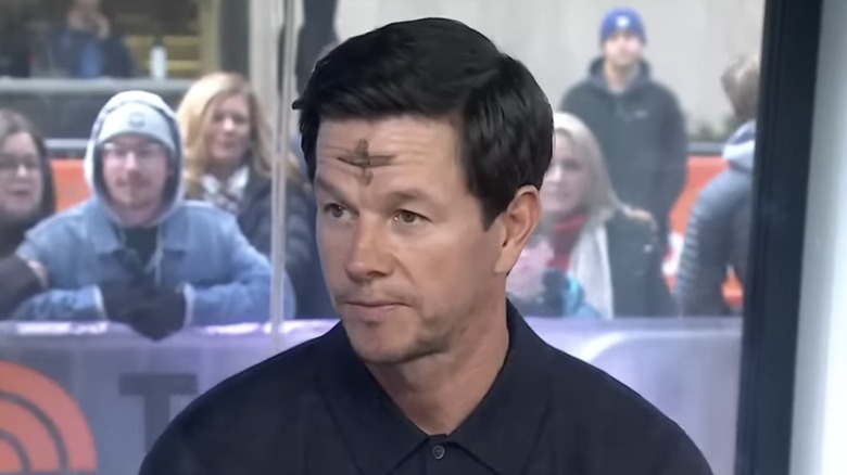 Mark Wahlberg with ashes on his face