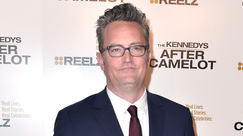 Matthew Perry wearing glasses