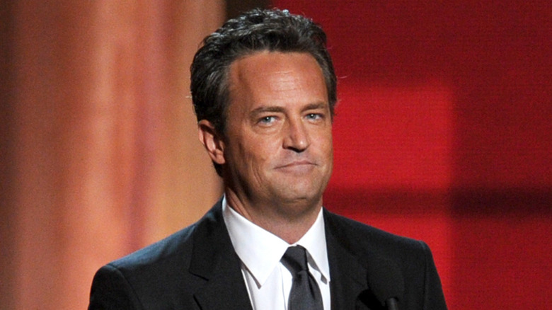 Matthew Perry in a suit