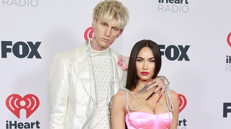 Machine Gun Kelly and Megan Fox posing