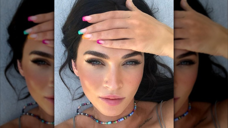 Megan Fox wearing colorful nails