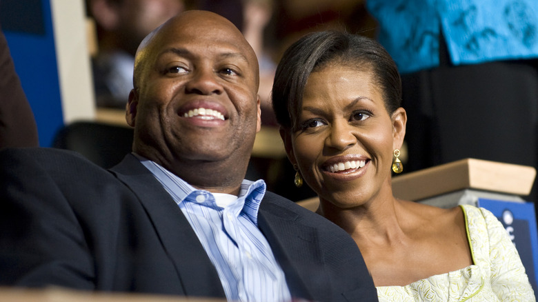 Michelle Obama and Craig Robinson smiling