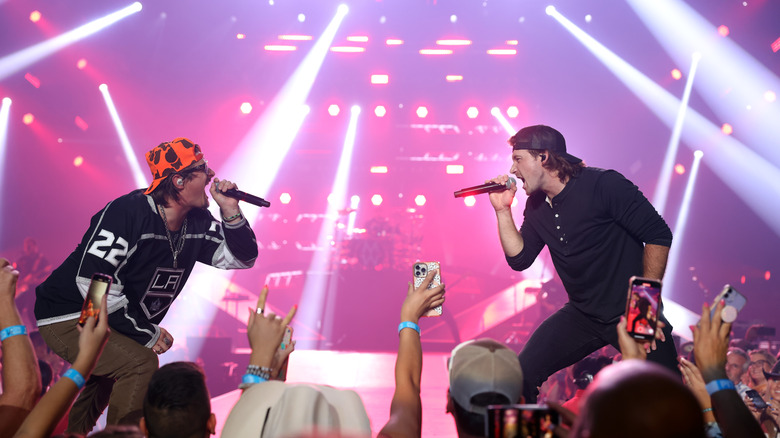 HARDY and Morgan Wallen performing onstage