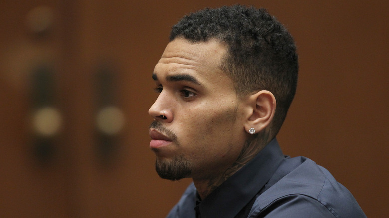 Chris Brown wearing an earring