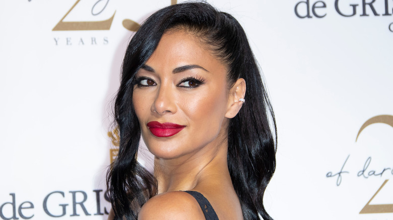 Nicole Scherzinger posing on the red carpet