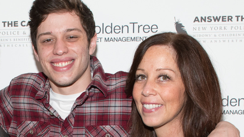 Pete Davidson and his mother Amy posing