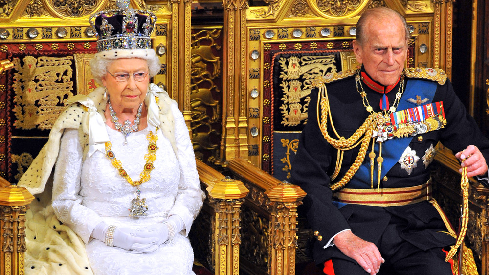 Queen Elizabeth and Prince Philip at an event 