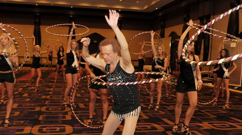 Richard Simmons doing hula hoops 