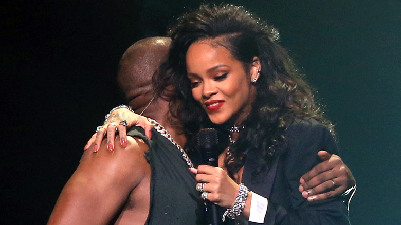 Kanye 'Ye' West hugs Rihanna in 2015