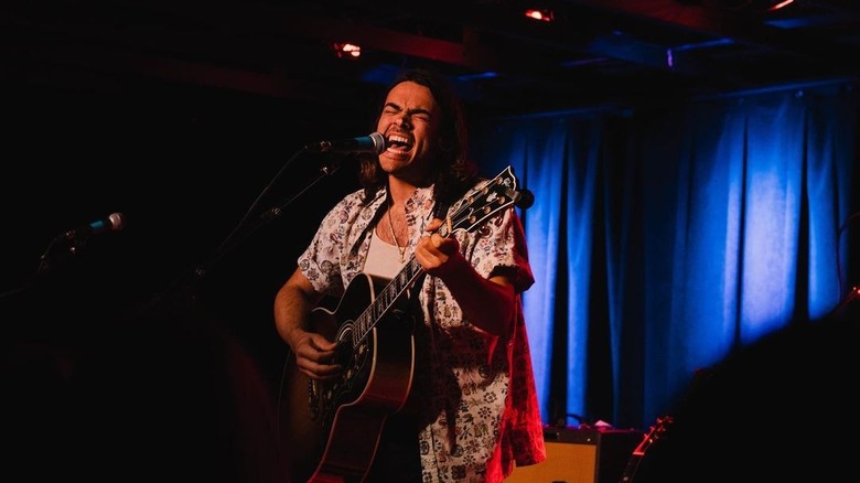 Derek Richard Thomas performing onstage