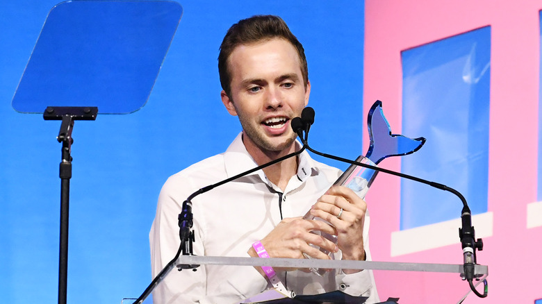 Ryland Adams accepting an award