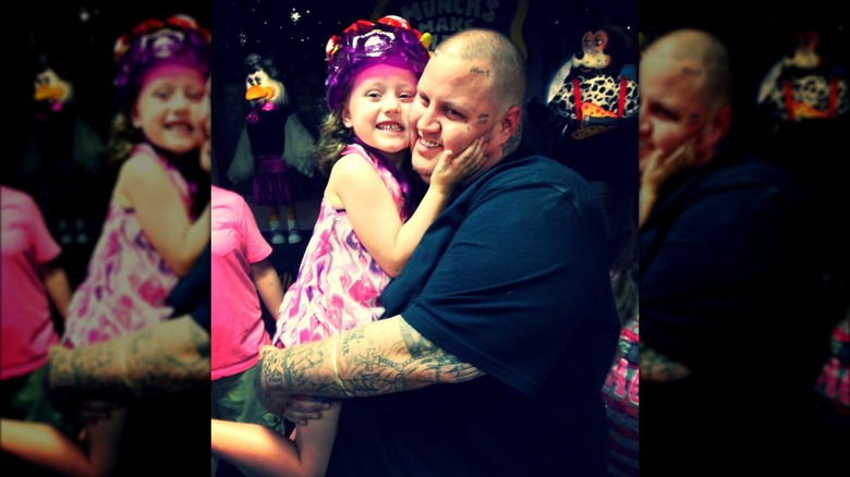 Jelly Roll posing with Bailee Ann when she was 5