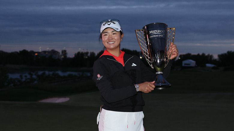 Rose Zhang posing with a trophy