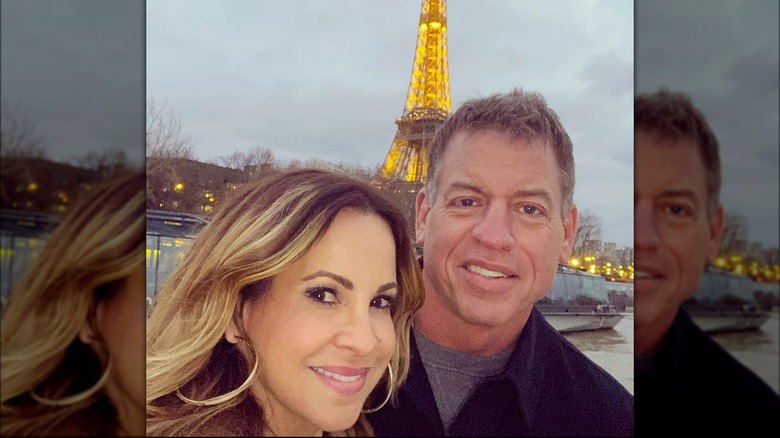 Catherine Mooty posing with Troy Aikman