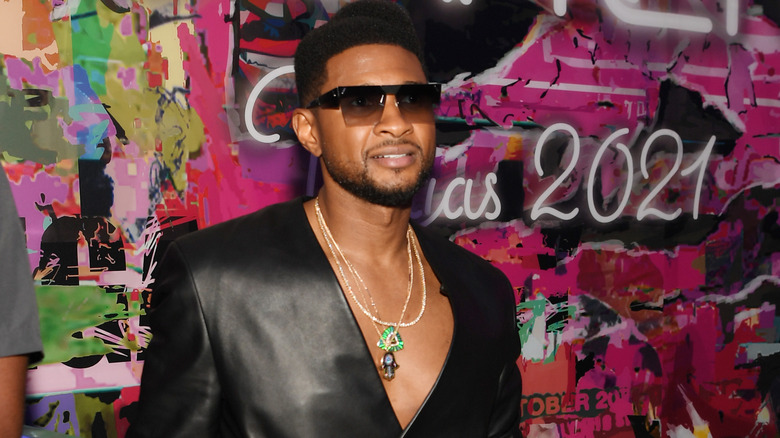 Usher wearing sunglasses