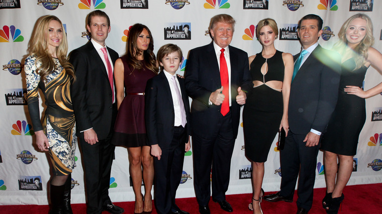 The Trump children pose with their father at "Celebrity Apprentice" event