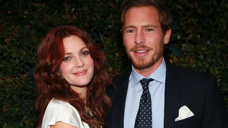 Drew Barrymore and Will Kopelman pose together