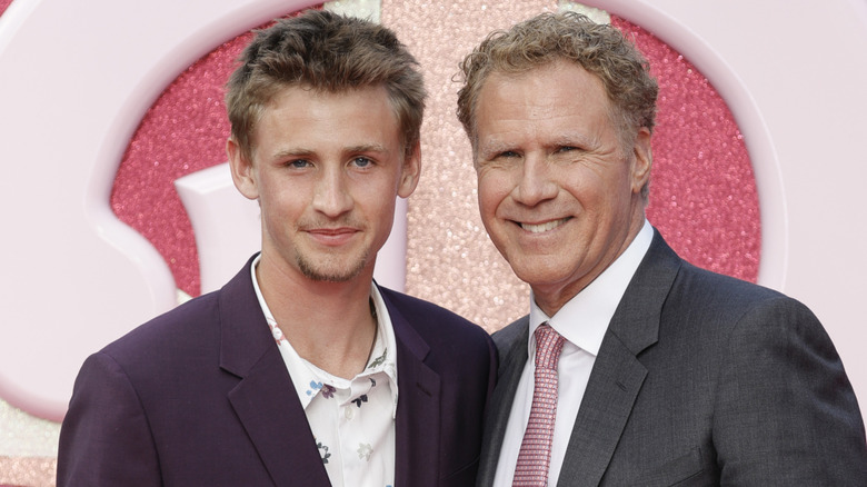 Magnus Ferrell and Will Ferrell posing on the red carpet for Barbie