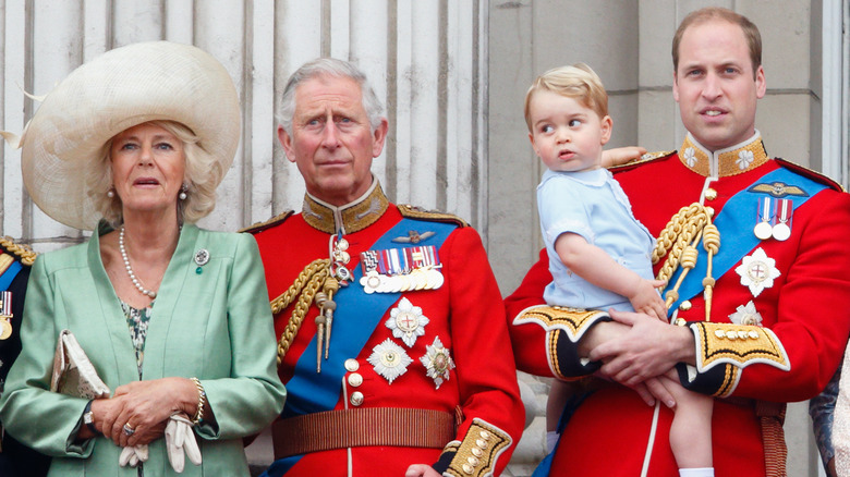 Camilla, King Charles, Prince George and Prince William on a balcony