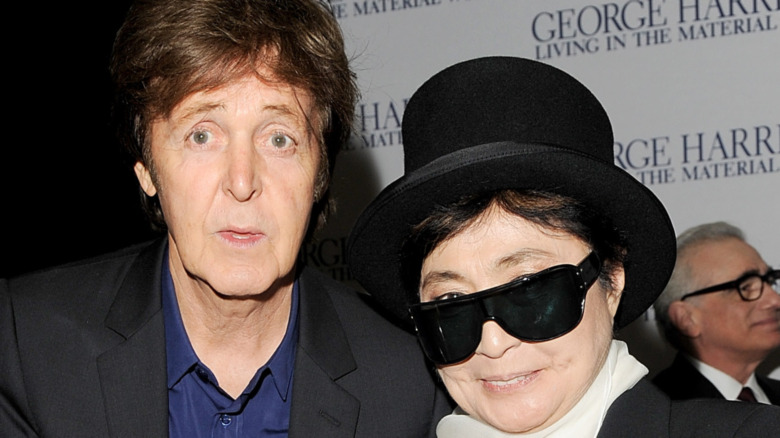 Paul McCartney and Yoko Ono smiling in 2011