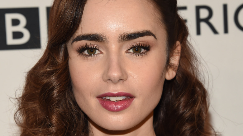 Lily Collins smiling