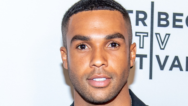 Lucien Laviscount smiling