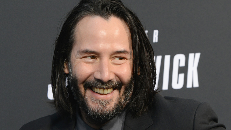 Keanu Reeves smiling 