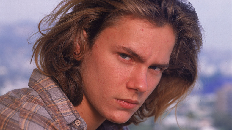 River Phoenix looking at camera