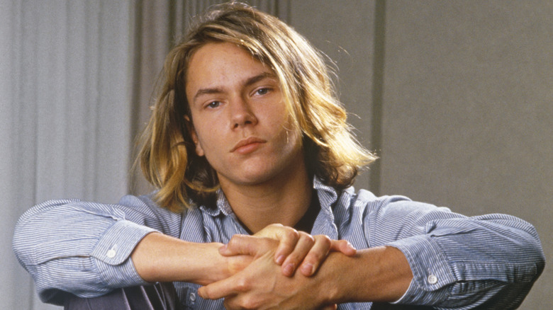 River Phoenix looking at camera