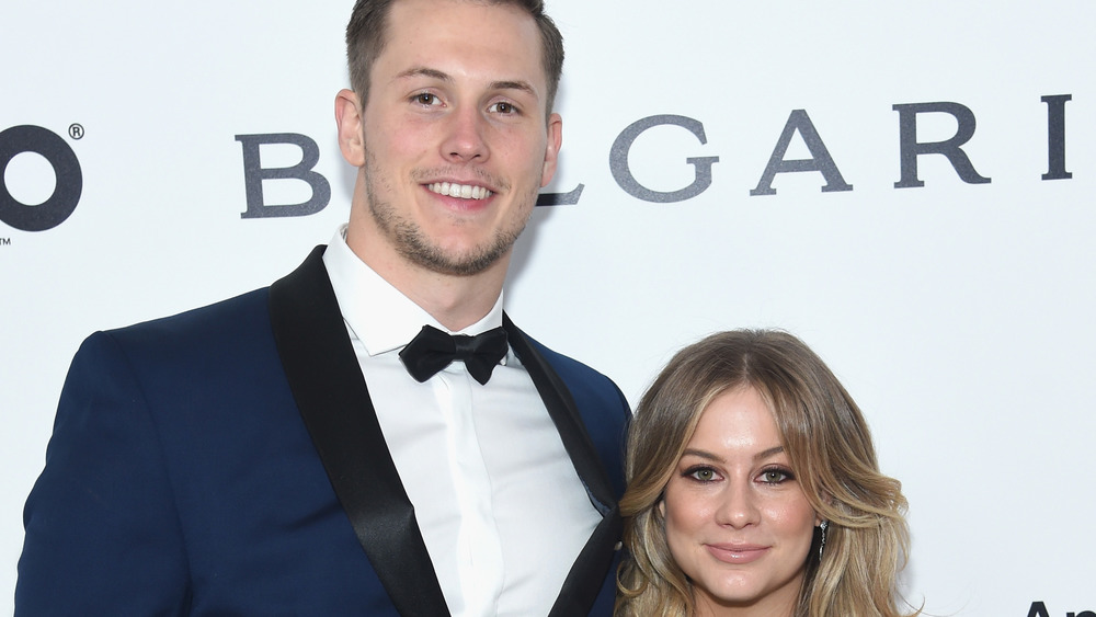 Shawn Johnson and Andrew East on a red carpet