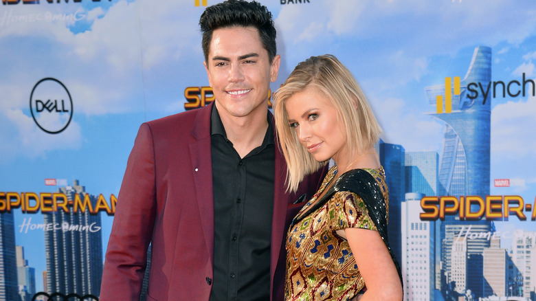 Tom Sandoval and Ariana Madix posing on red carpet