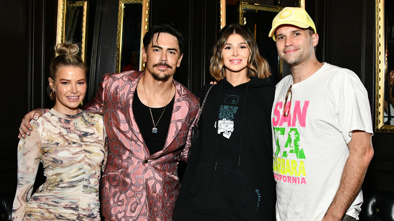 Tom Sandoval posing with Ariana Madix and friends