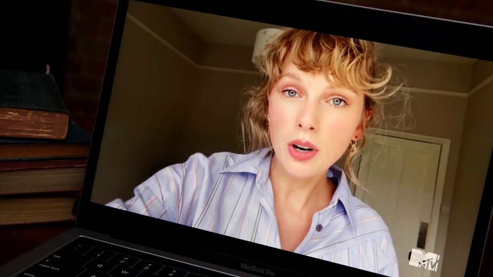 Taylor Swift on a laptop, streaming