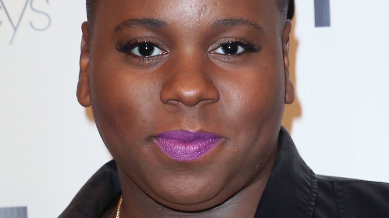 Alex Newell purple lipstick