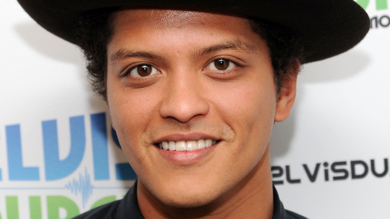 Bruno Mars slightly smiling