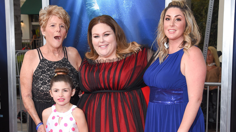 Chrissy Metz smiling with her family