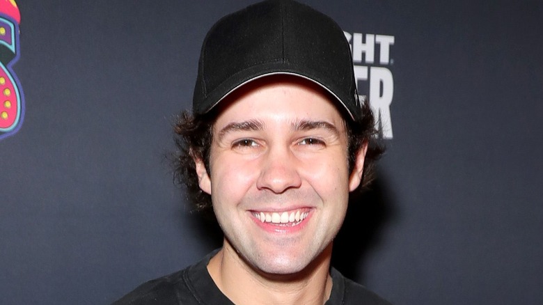 David Dobrik smiles