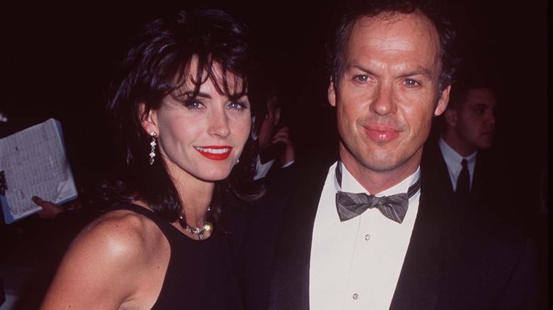 Courteney Cox and Michael Keaton posing 